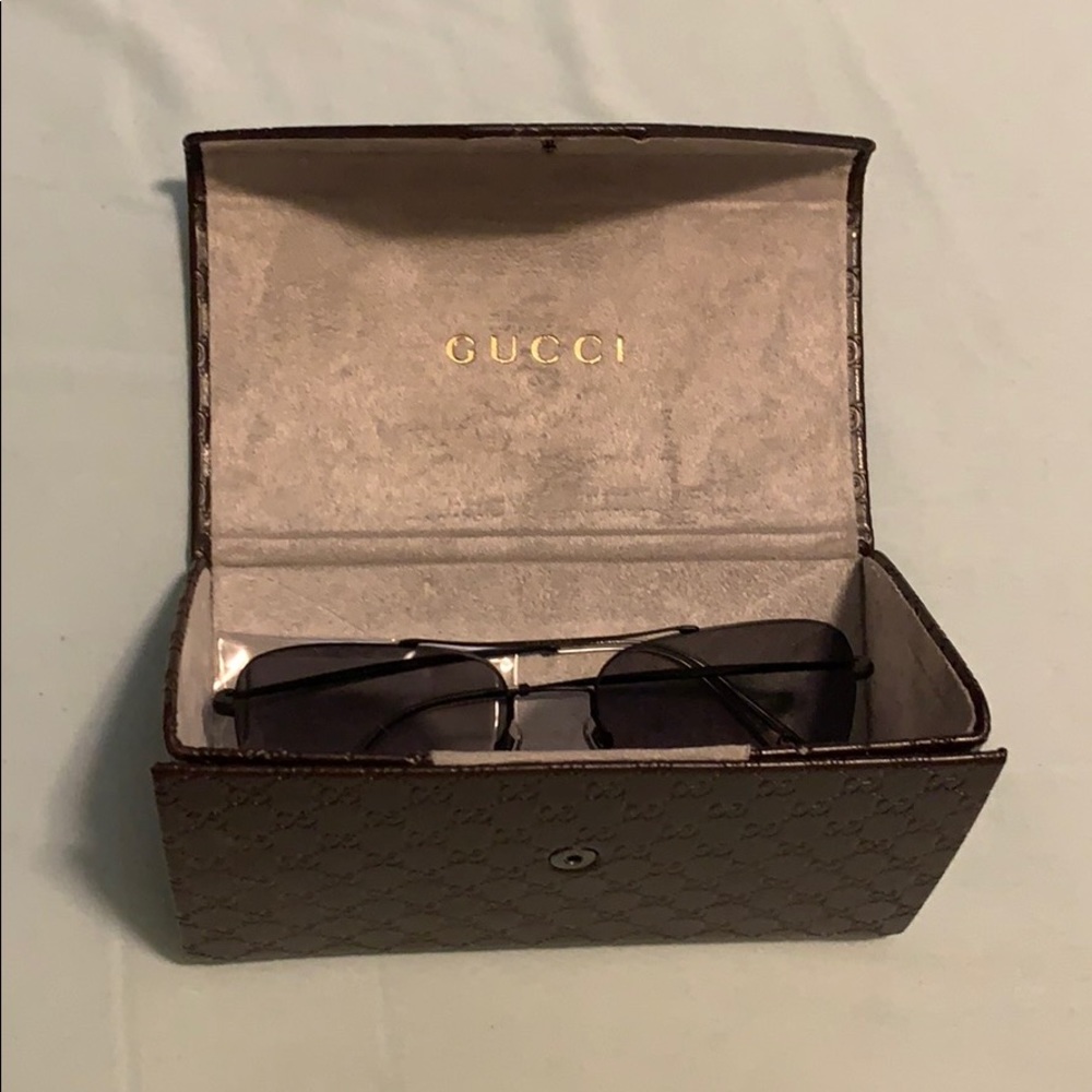 Gucci 59mm metal sunglasses with case.